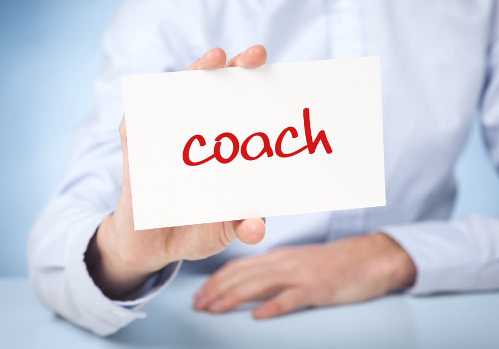 Person with a Coach label